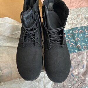 Ruck brand boots, never worn, in the box.